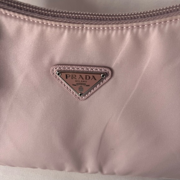 The Re-Nylon Re-Edition 2000 mini bag( has a little stain on the corner  )pic #3 - Picture 2 of 9